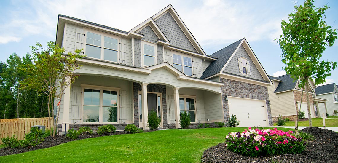 Gorgeous home exterior built for a neighborhood by Oconee Capital Home Builders.